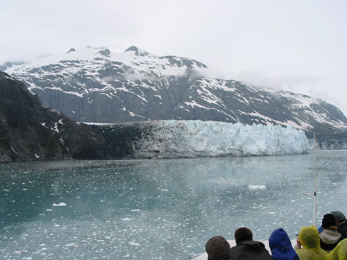 People watch glacier calving