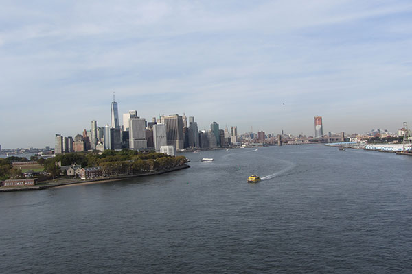 View of New York City skyline from ship deck as ship leaves port