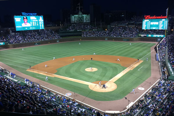 Wrigley Field view from behind home plate at night