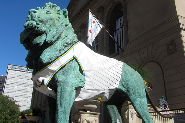 Lion statue wearing a basketball jersey outside the Art Institute