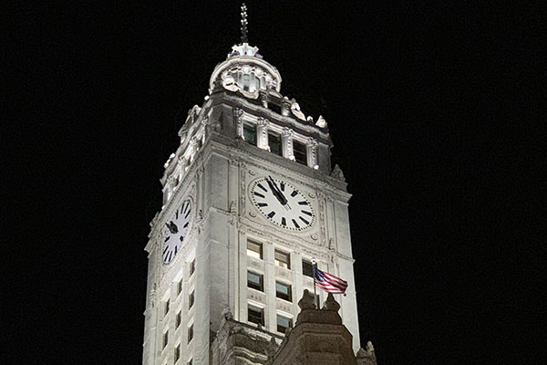 Wrigley Building clock at night