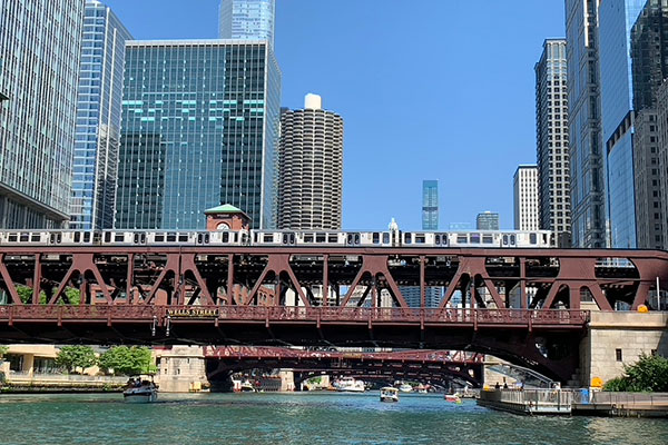 Train passes over Chicago River on bridge