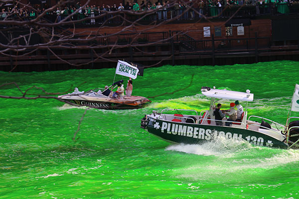 Two boats dye the Chicago River green