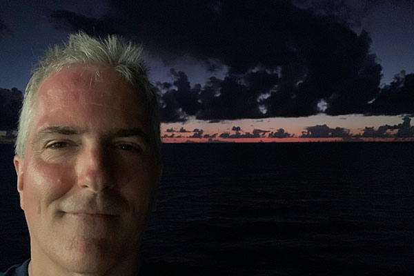 Selfie with sunset in background on Sunday