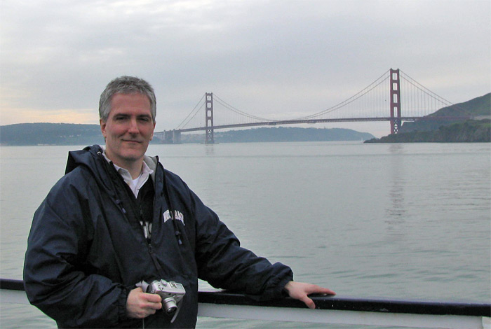 Pat in front of Golden Gate Bridge from San Francisco Bay