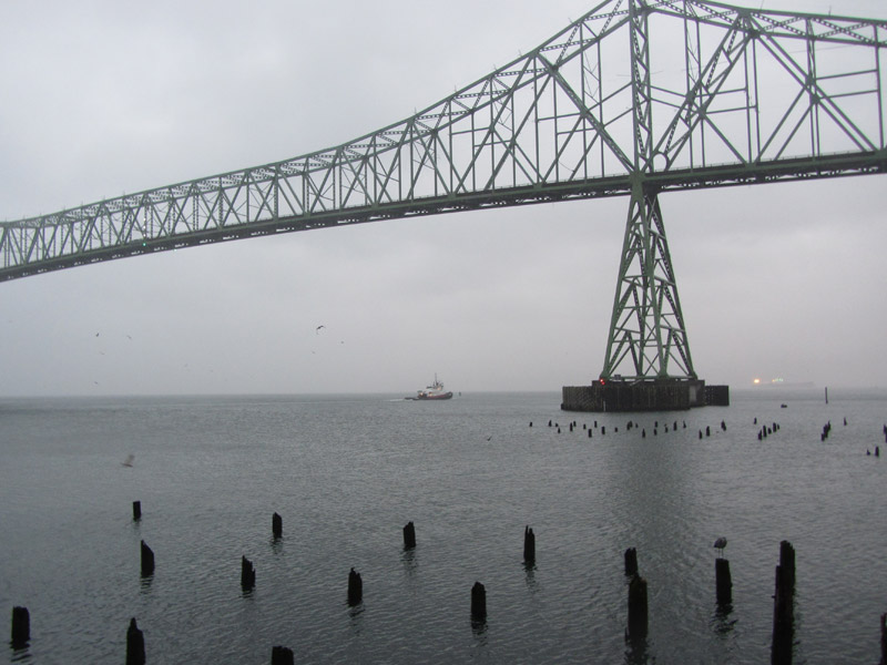 Bridge over water as rain falls