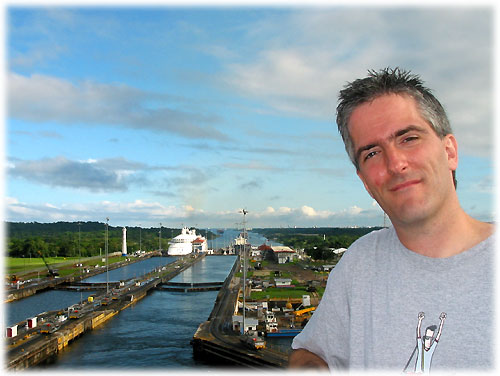 Pat poses in front of Panama Canal