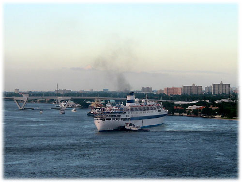 tugboat pushing ship