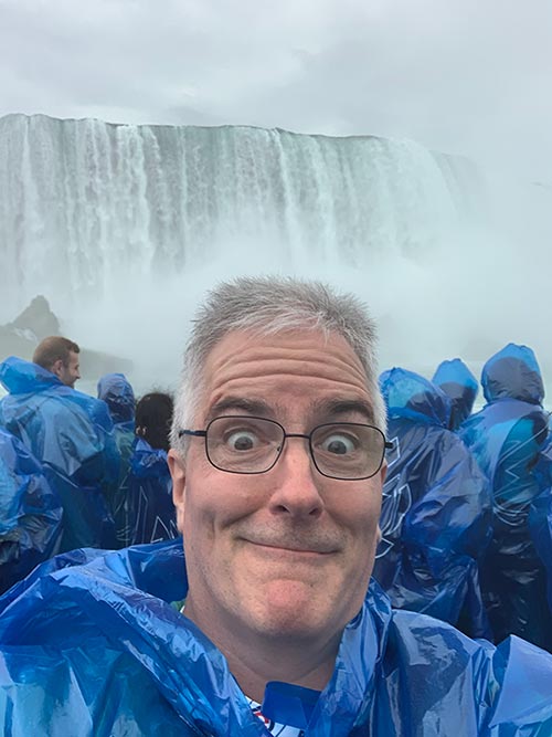 Pat anticipating getting wet on the Maid of the Mist