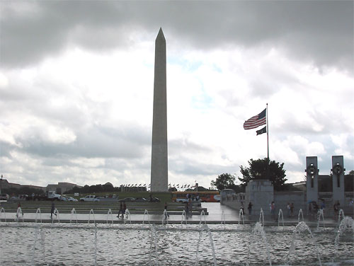 Washington Monument and World War Two Memorial during rain storm