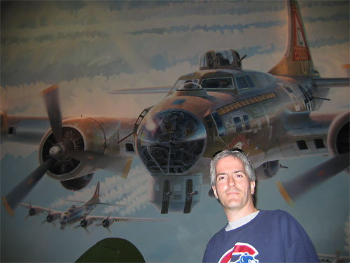 Pat in front of painting of B-17