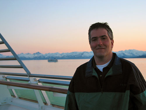 Pat with boat behind him