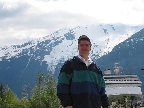 Pat with mountains and ship in background
