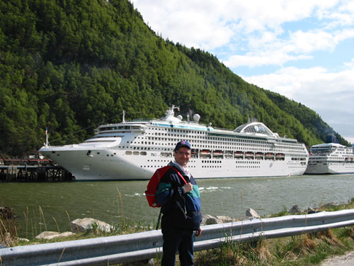 Pat in front of ship