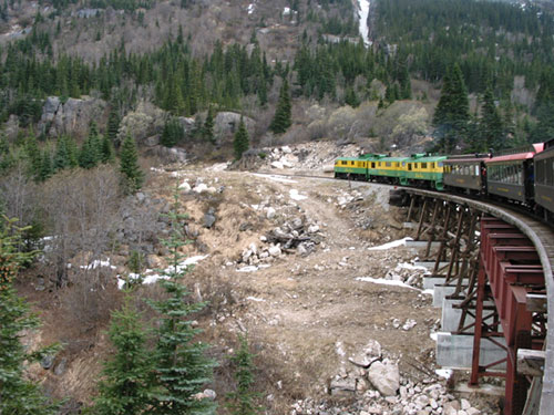 Train travels over bridge