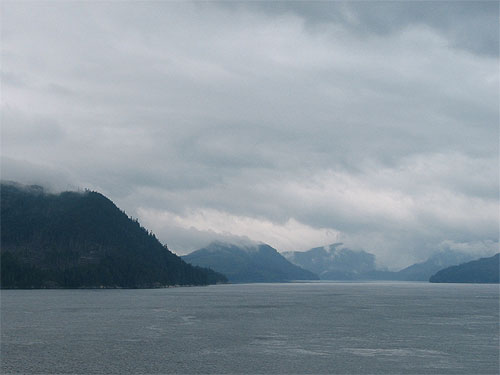 Distant view of mountains behind water