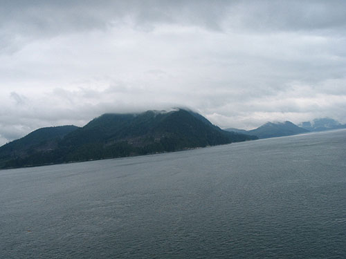 water with mountains and clouds