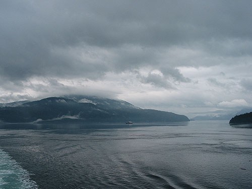 Ship sailing past a fork in the water