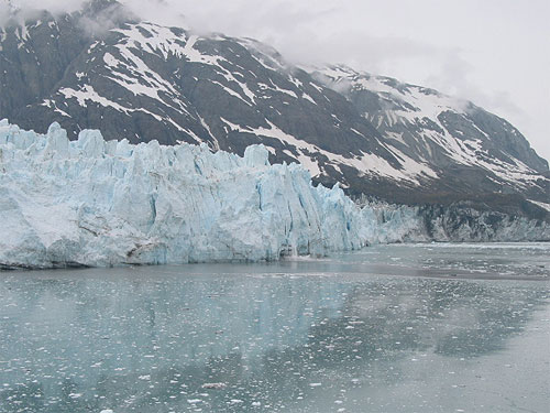 Water with glacier and mountain in background