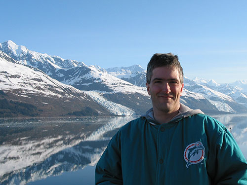 Pat smiles as the ship leave College Fjord