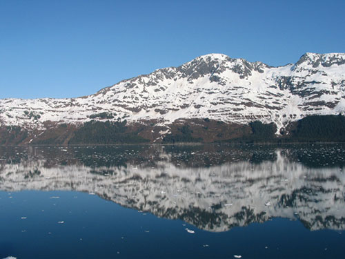 Mountain rise beyond the water