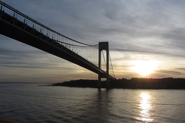 Verrazzano-Narrows Bridge from ship with sunset in the background