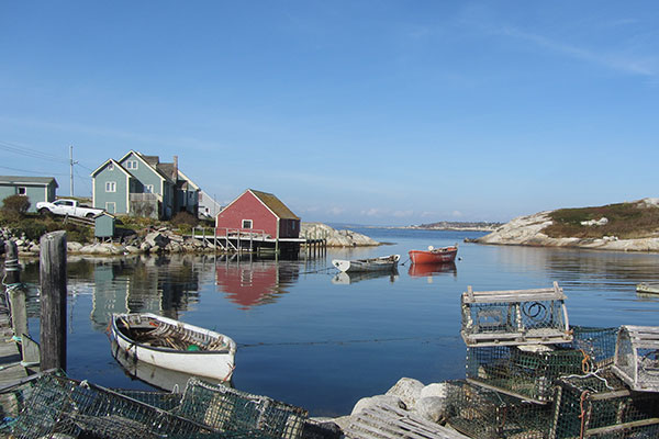 Lobster traps on dock near water