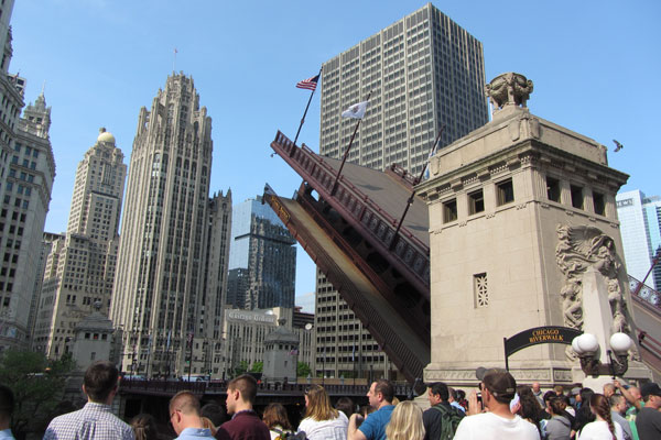 Michigan Avenue Bridge with people watching it go up