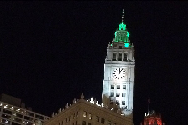 Riverwalk view of the Wrigley Building clock