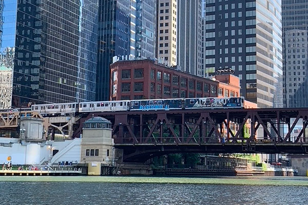 CTA train going over a bridge