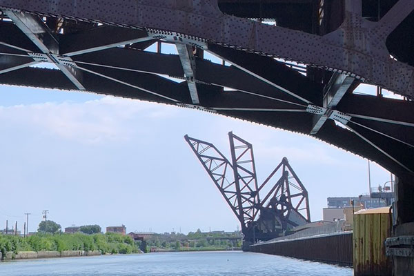 View of old bridges from under a bridge on Chicago River