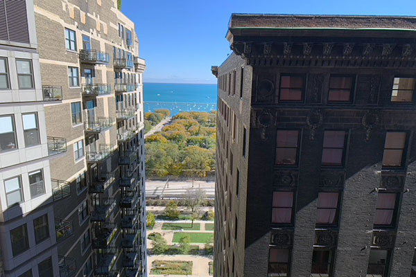 Two buidings with Lake Michigan in background