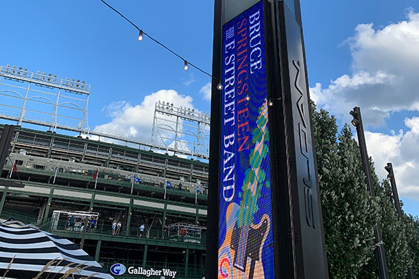 Sign at Gallaher Way nect to Wrigley Field reads Bruce Springsteen and the E Street Band