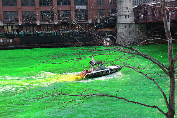 Dyeing the Chicago River green as viewed from the riverwalk