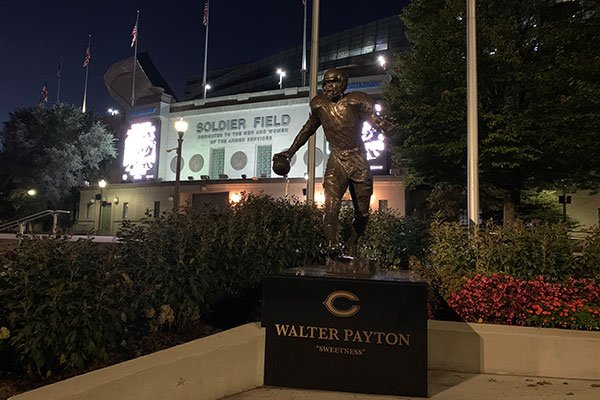 Walter Payton statue at Soldier Field at night