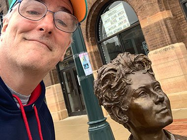Pat stands next to Marion Ross statue