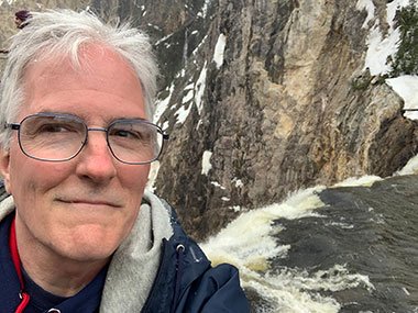 Pat next to waterfall