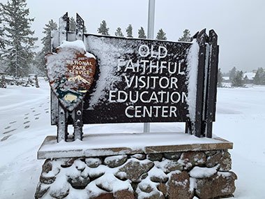 Sign reads Yellowstone National Park Visitor Educations Center