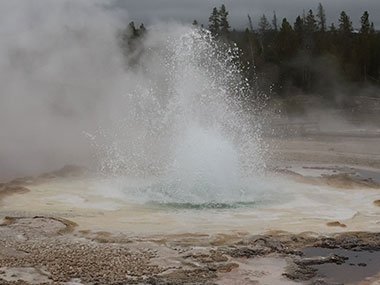 Yellowstone National Park geyser erupts in the morning