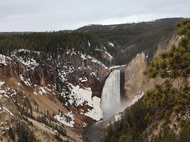 Yellowstone National Park Lower Falls beneath clouds