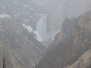 Yellowstone National Park Lower Falls during snow storm