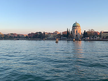 Water taxi passes an island