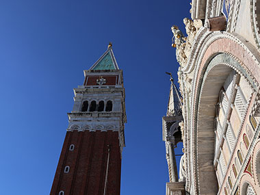 Bell tower standing behind St. Mark's Basilica