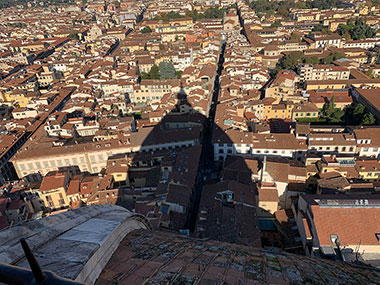 Shadow of Basilica dome shades neighborhood