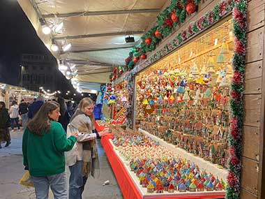 Two people looking at ornaments