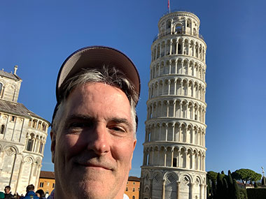 Pat between the Pisa Cathedral and Leaning Tower of Pisa