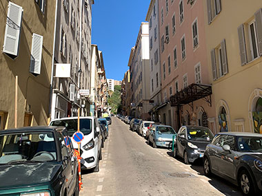 Car parked on both sides of the street