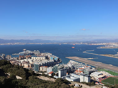 Runway with cruise ship in distance from Tunnels of Gibraltar