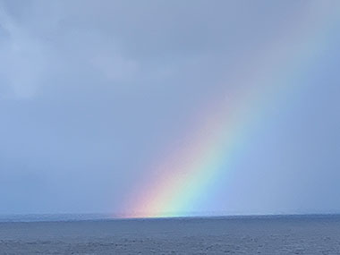 Rainbow over water