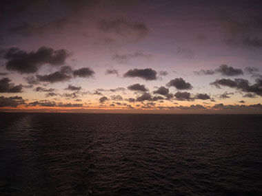 Clouds in partially lit sky